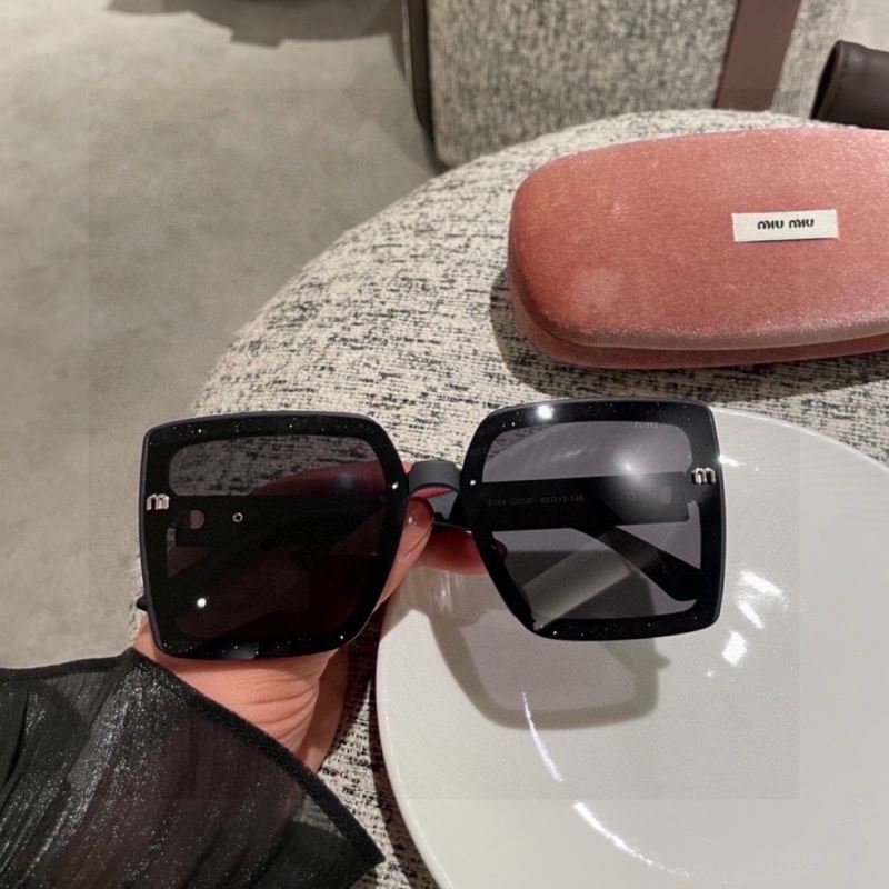 Miu miu Sunglasses